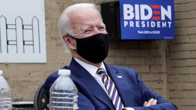 Democratic U.S. presidential candidate and former Vice President Joe Biden listens as he meets with local residents at the sports bar Carlette?s Hideaway during a campaign stop in Yeadon, Pennsylvania U.S., June 17, 2020.