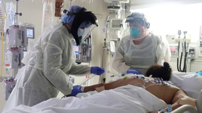 Medical staff attend to a patient suffering from the coronavirus disease (COVID-19) in the Intensive Care Unit (ICU), at Scripps Mercy Hospital in Chula Vista, California, U.S., May 12, 2020.