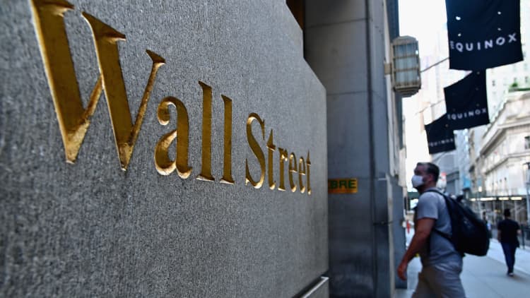Wall Street points to flat open ahead of busiest week of earnings season