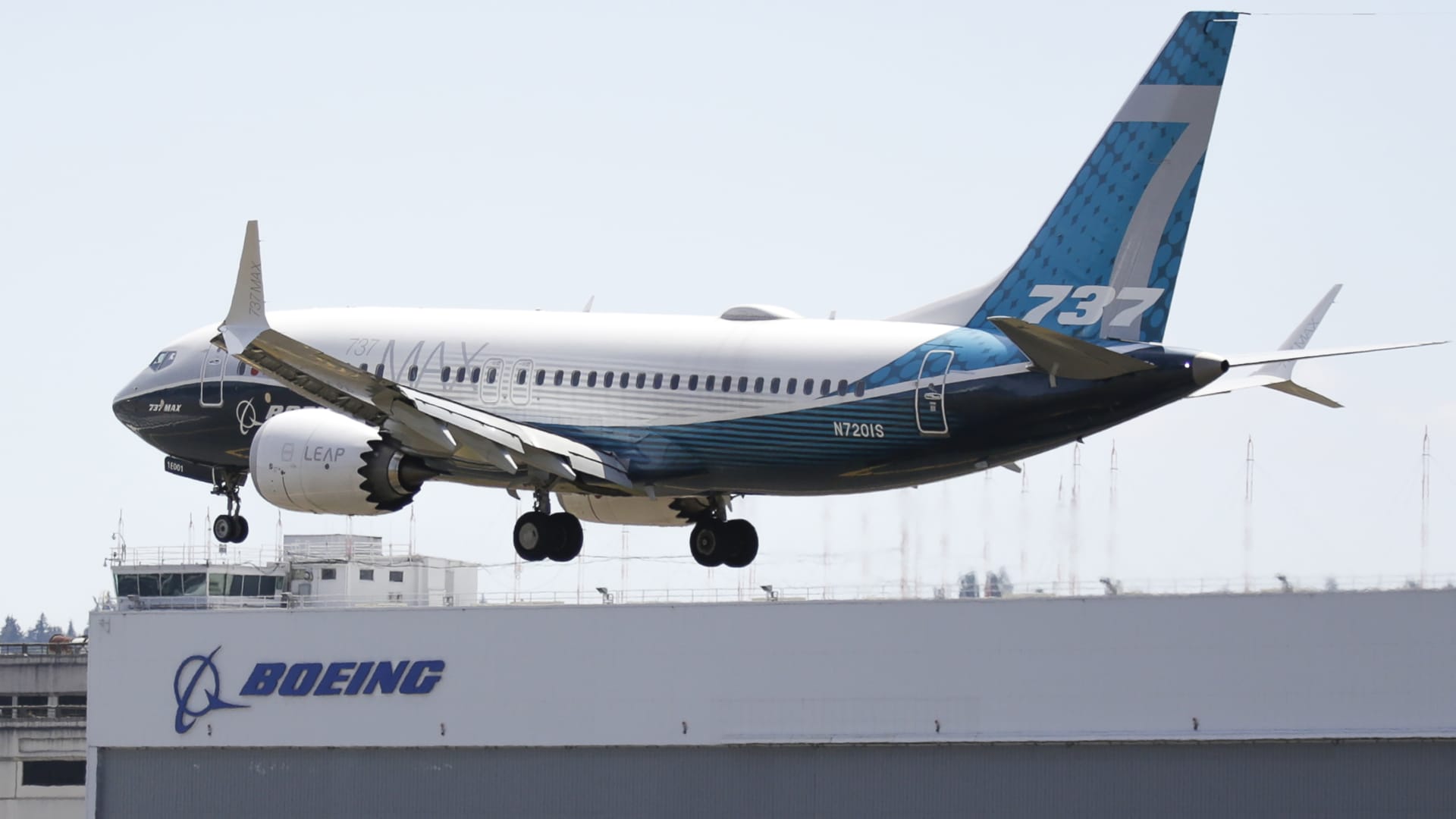 A Boeing 737 MAX jet lands following a Federal Aviation Administration (FAA) test flight at Boeing Field in Seattle, Washington on June 29, 2020.
