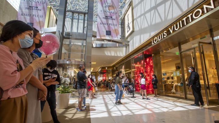 Louis Vuitton reduces thermostat and light use in shops to save