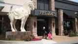 A statue of a horse stands at the entrance to a P.F. Chang's restaurant in Schaumburg, Illinois.