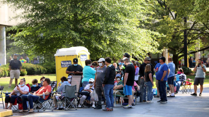 Hundreds of unemployed Kentucky residents wait in long lines outside the Kentucky Career Center for help with their unemployment claims on June 19, 2020 in Frankfort, Kentucky. While the economic recovery has brought back jobs since the lowest point of the Covid-19 crisis, millions of Americans remain unemployed.