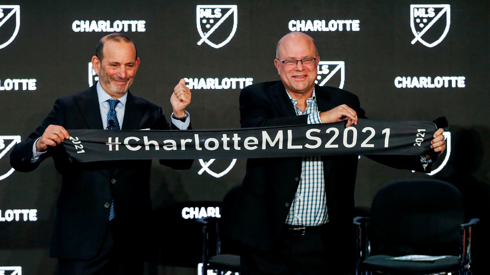 MLS Commissioner Don Garber, left, and Charlotte MLS owner David Tepper announce that Major League Soccer will be coming to Charlotte in 2021 at an event in Charlotte, N.C., Tuesday, Dec. 17, 2019.