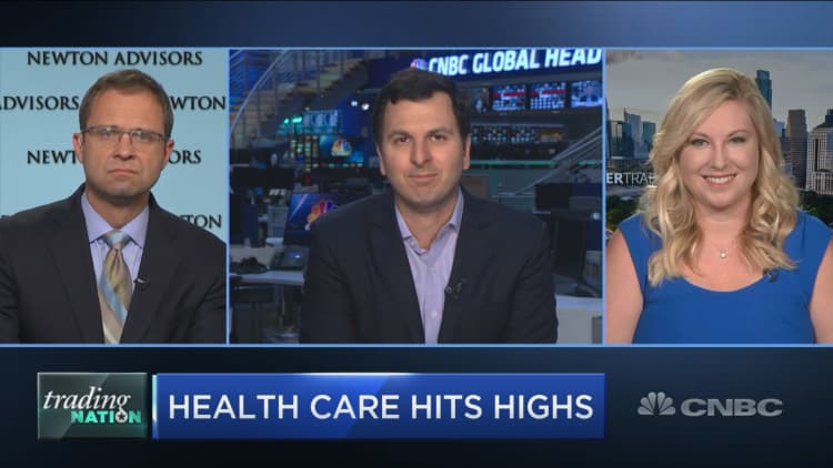 As health care stocks hit highs, traders pick their favorites