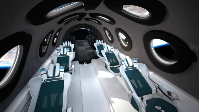 A virtual rendering of the inside of Virgin Galactic's spacecraft cabin, with six seats for passengers.