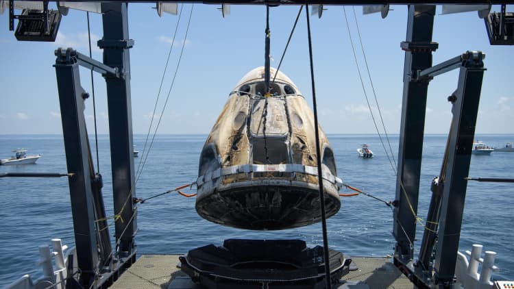 SpaceX's Crew Dragon returns to Earth, marking the beginning of a new era in U.S. spaceflight