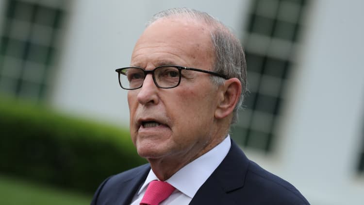 Watch a timeline of White House advisor Larry Kudlow predicting a 'V-shaped recovery'