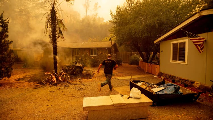 Wildfires rage across Northern California amid record heat and lightning strikes