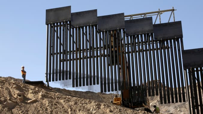 A construction crew works on a bollard-type private border wall, crowd-funded by We Build The Wall group at Sunland Park, New Mexico, as pictured from Ciudad Juarez, Mexico May 30, 2019.