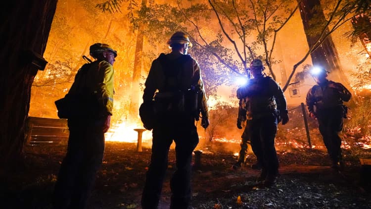 Three massive wildfires are burning through California, forcing thousands of evacuations