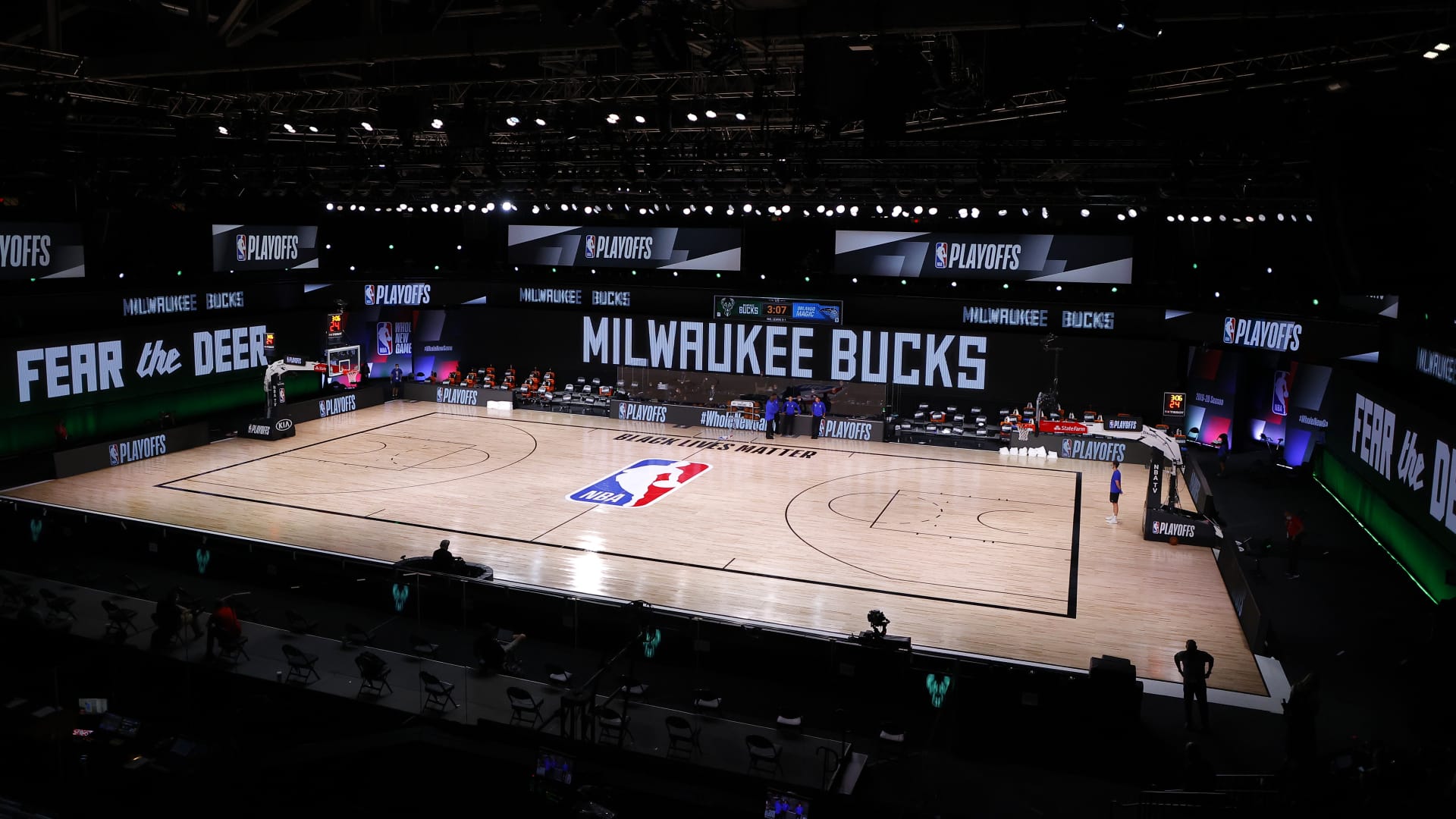 An empty court and bench is shown before the start of a scheduled game between the Milwaukee Bucks and the Orlando Magic for Game Five of the Eastern Conference First Round during the 2020 NBA Playoffs at AdventHealth Arena at ESPN Wide World Of Sports Complex on August 26, 2020 in Lake Buena Vista, Florida.