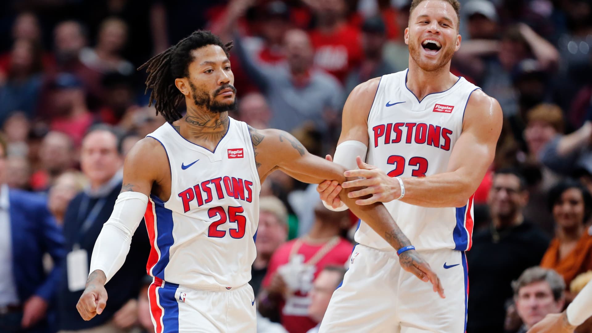 Detroit Pistons guard Derrick Rose (25) celebrates the game winning score with forward Blake Griffin (23) in the second half of an NBA basketball game in New Orleans, Monday, Dec. 9, 2019.