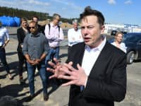 Elon Musk, CEO of Tesla, speaks to media representatives at the Tesla Gigafactory construction site In Grünheide near Berlin, September 3, 2020.