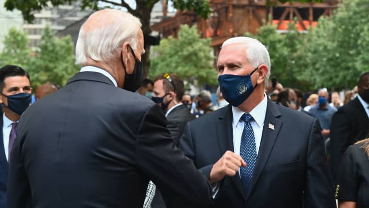 Joe Biden and Mike Pence meet and elbow bump at 9/11 Memorial in New York City