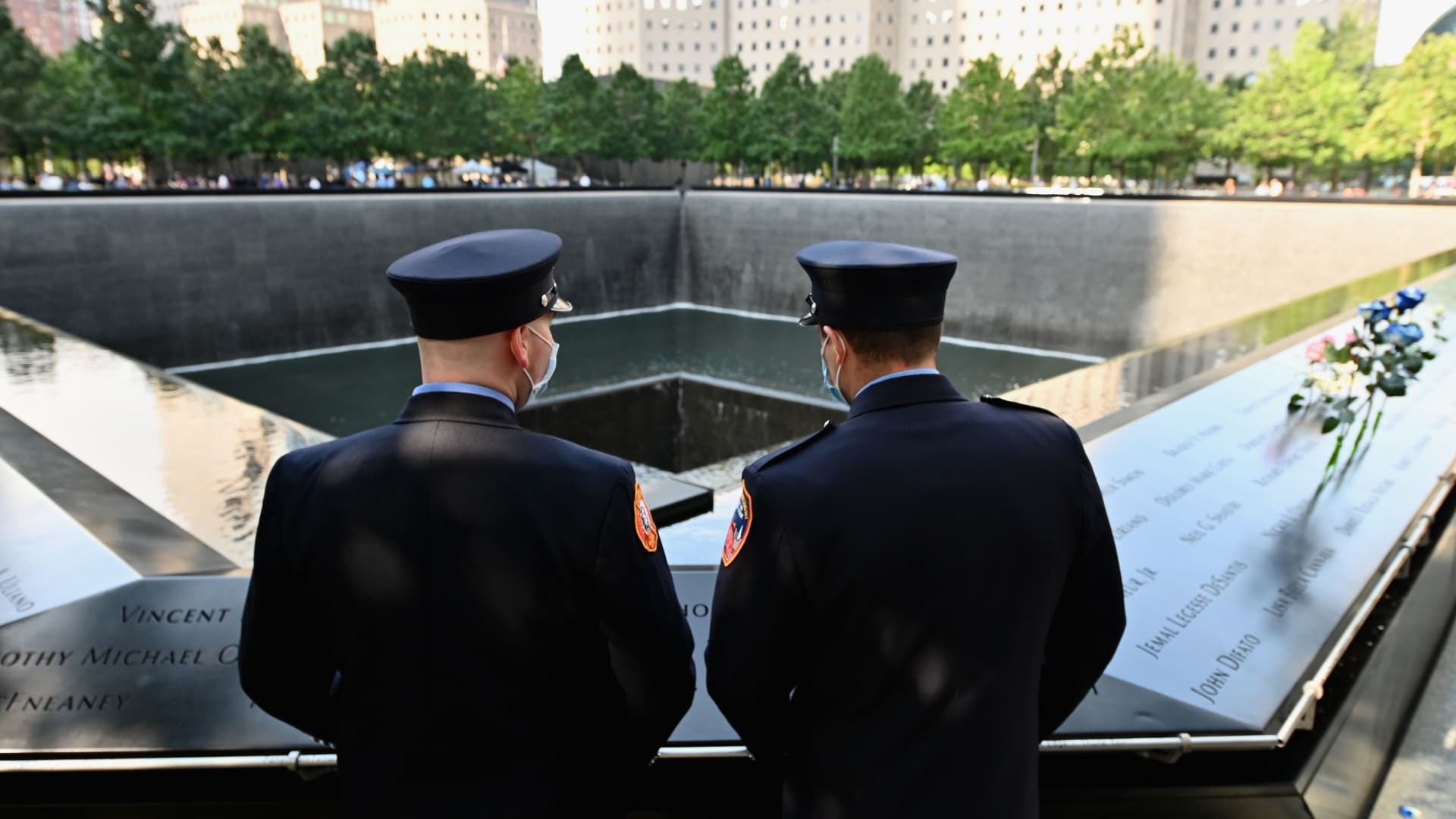 New York Firefighters gather at the 9/11 Memorial & Museum in New York on September 11, 2020, as the US commemorates the 19th anniversary of the 9/11 attacks.