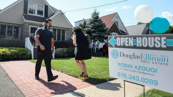 People wait to visit a house for sale in Floral Park, Nassau County, New York.