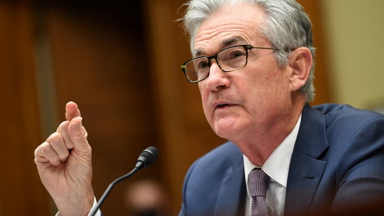 Fed Chairman Powell says the economy will face challenges for the next few months