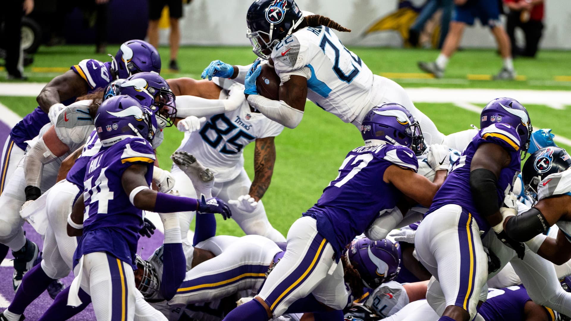 Derrick Henry #22 of the Tennessee Titans dives with the ball into the end zone for a touchdown in the third quarter of the game against the Minnesota Vikings at U.S. Bank Stadium on September 27, 2020 in Minneapolis, Minnesota.