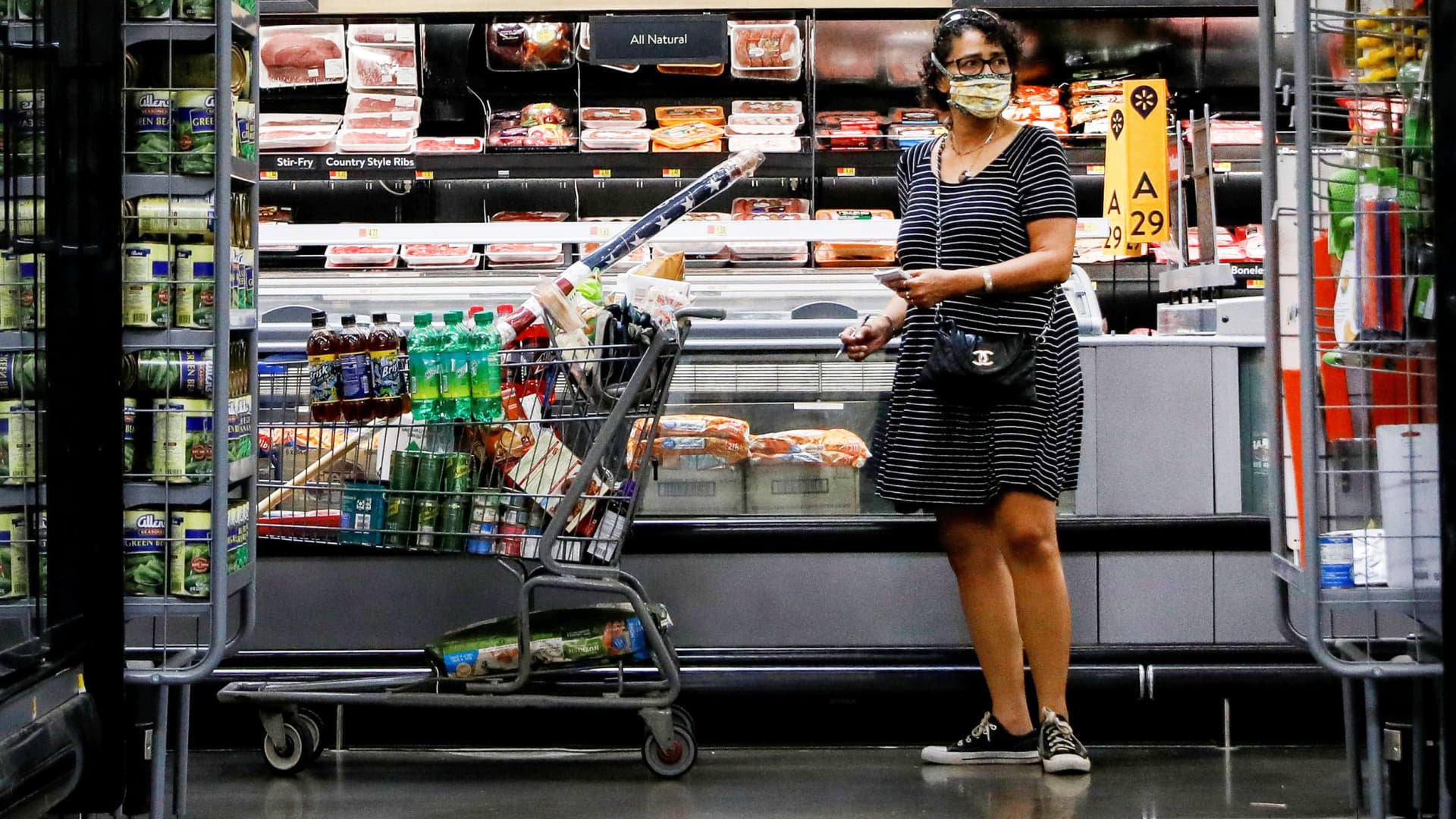 A shopper is seen wearing a mask while shopping at a Walmart store in Bradford, Pennsylvania, July 20, 2020.