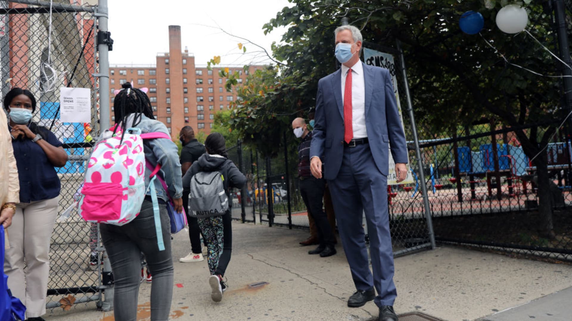 New York City Mayor Bill de Blasio stands at P.S. 188 as he welcomes elementary school students back to the city's public schools for in-person learning on September 29, 2020 in New York City.