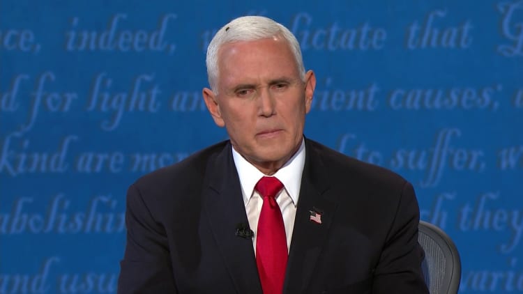 Fly lands on Vice President Mike Pence's head during debate