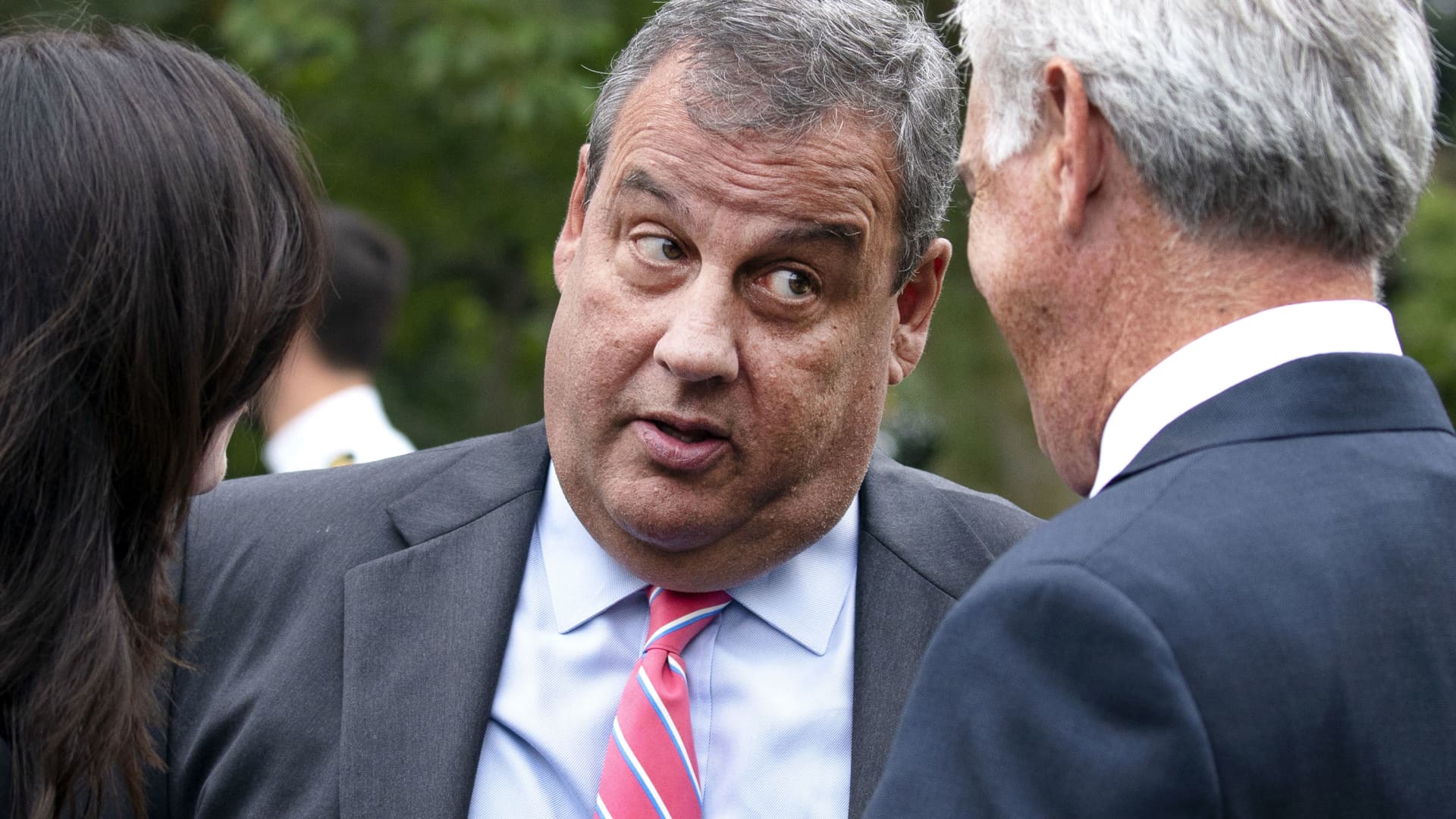 Chris Christie, former Governor of New Jersey, center, speaks with attendees following the announcement of U.S. President Donald Trump's nominee for associate justice of the U.S. Supreme Court during a ceremony in the Rose Garden of the White House in Washington, D.C., on Saturday, Sept. 26, 2020.
