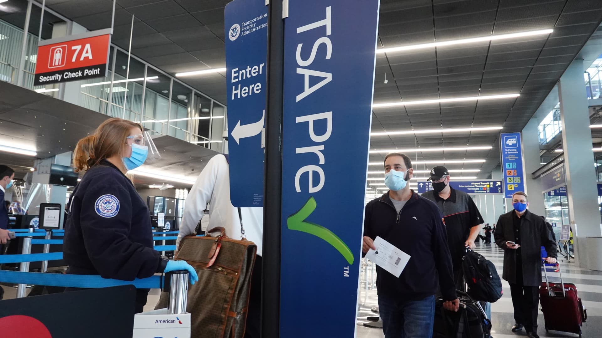 Passengers enter a Transportation Security Administration (TSA) checkpoint at O'Hare International Airport on October 19, 2020 in Chicago, Illinois.