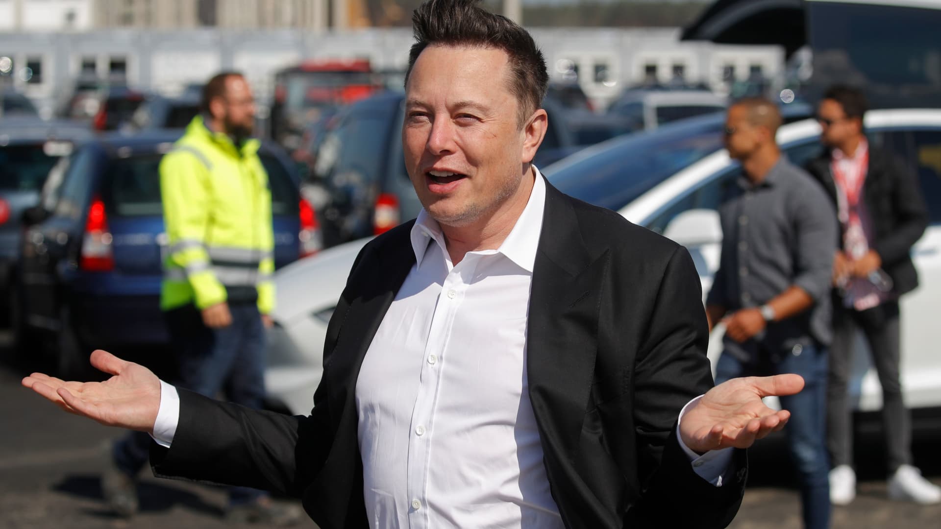 Tesla CEO Elon Musk gestures as he arrives to visit the construction site of the future US electric car giant Tesla, on September 03, 2020 in Gruenheide near Berlin.