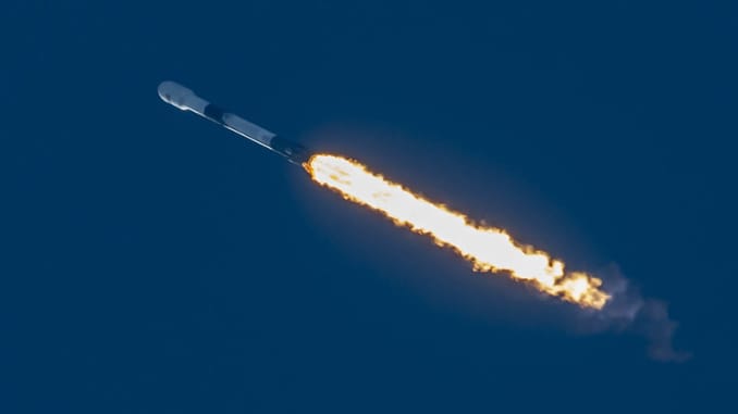 A Falcon 9 rocket launches the company's 14th Starlink mission on Oct. 18, 2020.