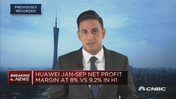 Huawei's third-quarter revenue growth slows, hit by U.S. sanctions