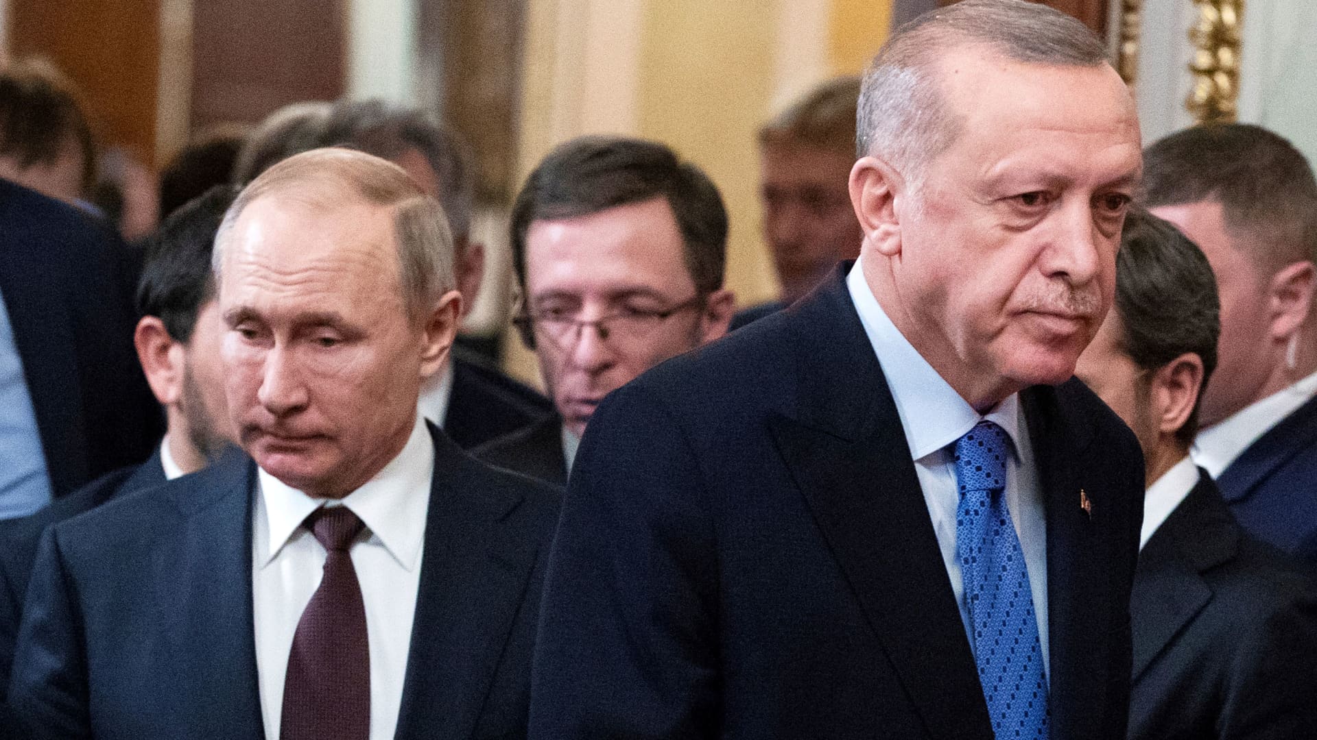 Russian President Vladimir Putin and Turkish President Tayyip Erdogan arrive for a news conference following their talks in Moscow, Russia March 5, 2020.