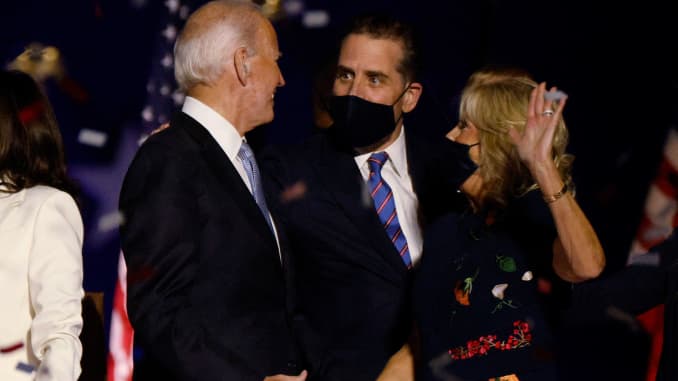 Democratic 2020 U.S. presidential nominee Joe Biden, his son Hunter and his wife Jill celebrate onstage at his election rally, after the news media announced that Biden has won the 2020 U.S. presidential election over President Donald Trump, in Wilmington