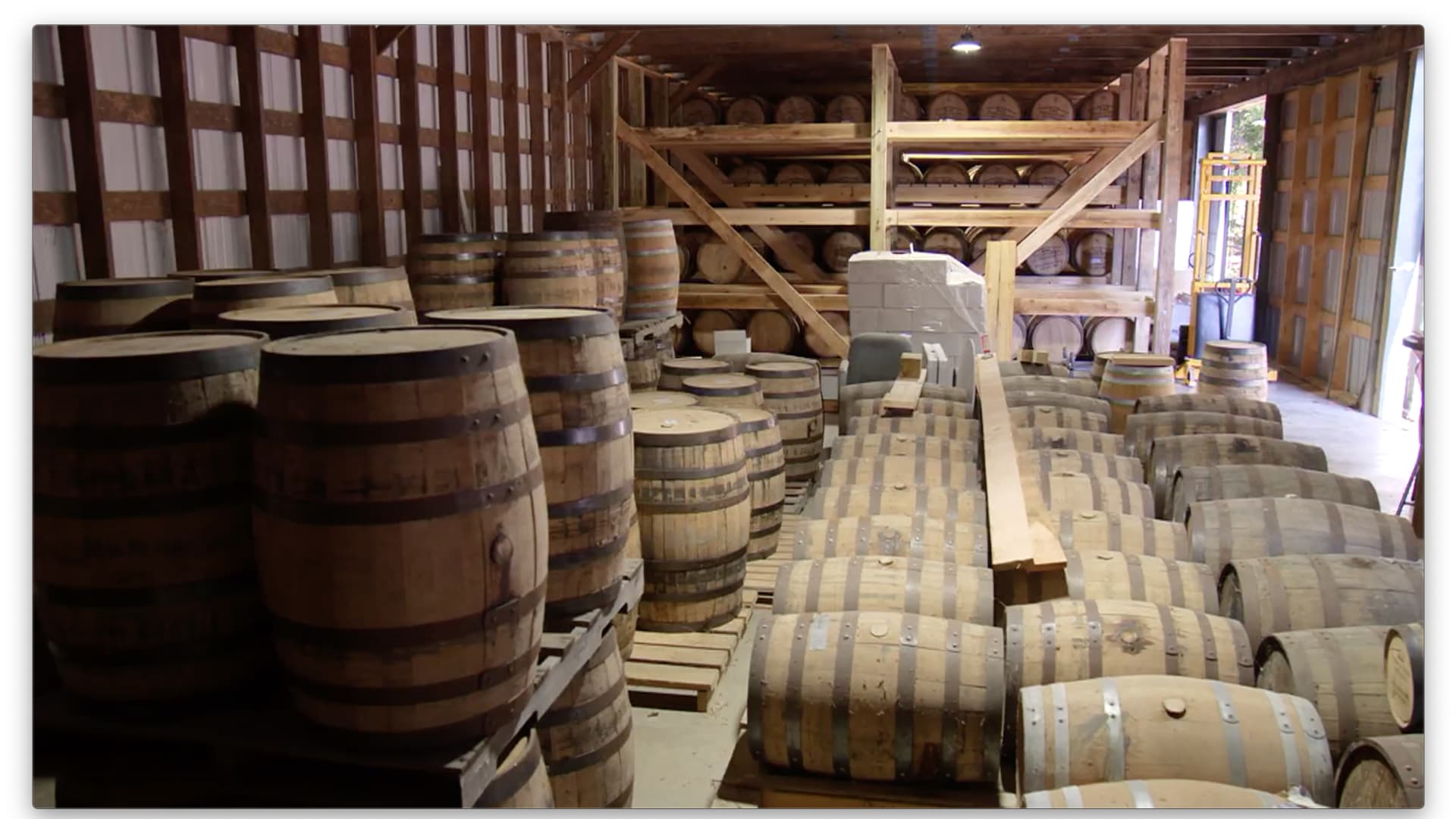 Barrels of spirits age at the Tobacco Barn Distillery in Hollywood, Maryland.