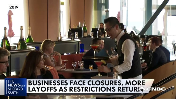 Businesses face closures and more layoffs as Covid-19 restrictions return