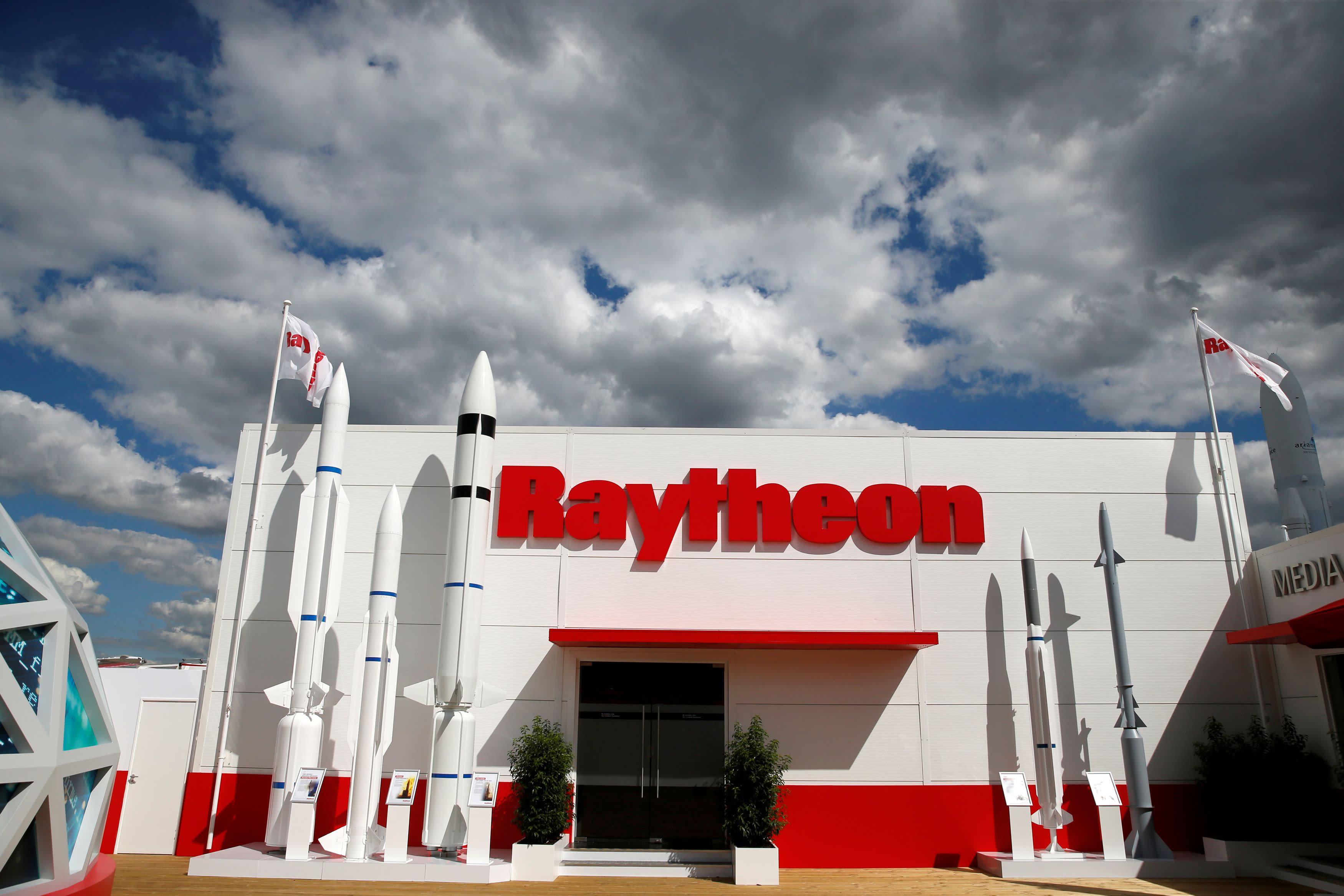 Stocks making the biggest moves midday: Raytheon, Block, Tesla, Foot Locker and more