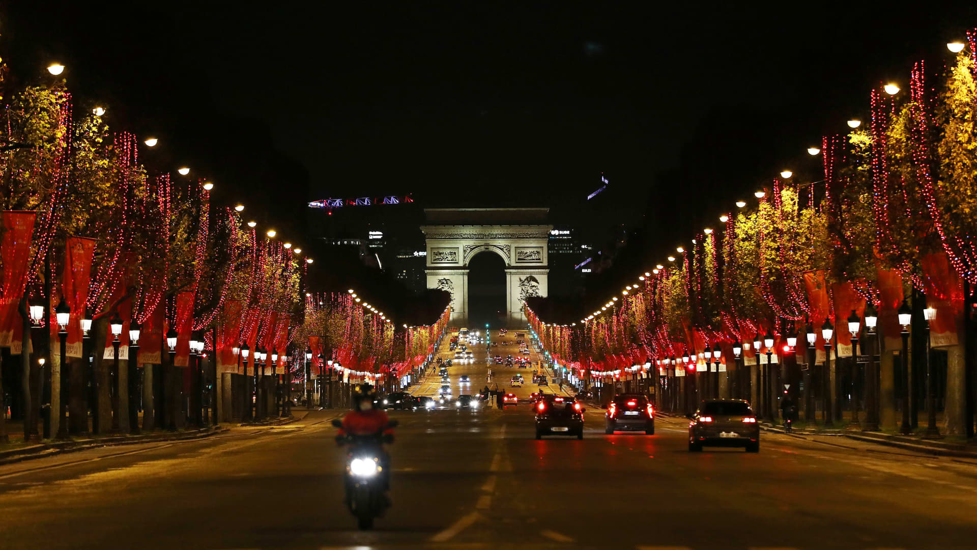The Champs-Elysees Avenue and the Arc de Triomphe are seen after the Christmas illuminations were switched on in Paris, France, Nov. 22, 2020.