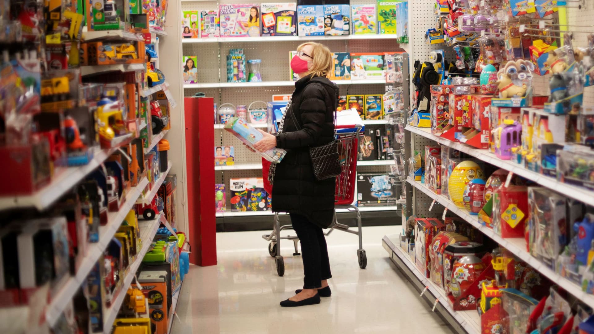 A shopper wearing a face mask due to the coronavirus disease (COVID-19) pandemic browses toys at a Target store in King of Prussia, Pennsylvania, November 20, 2020.