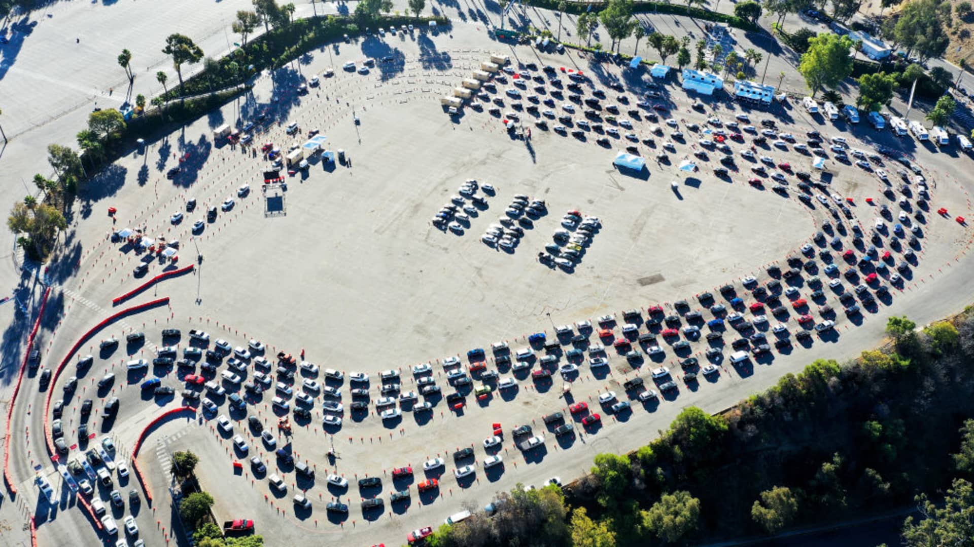 In an aerial view from a drone, cars are lined up at Dodger Stadium for COVID-19 testing on the Monday after Thanksgiving weekend on November 30, 2020 in Los Angeles, California.