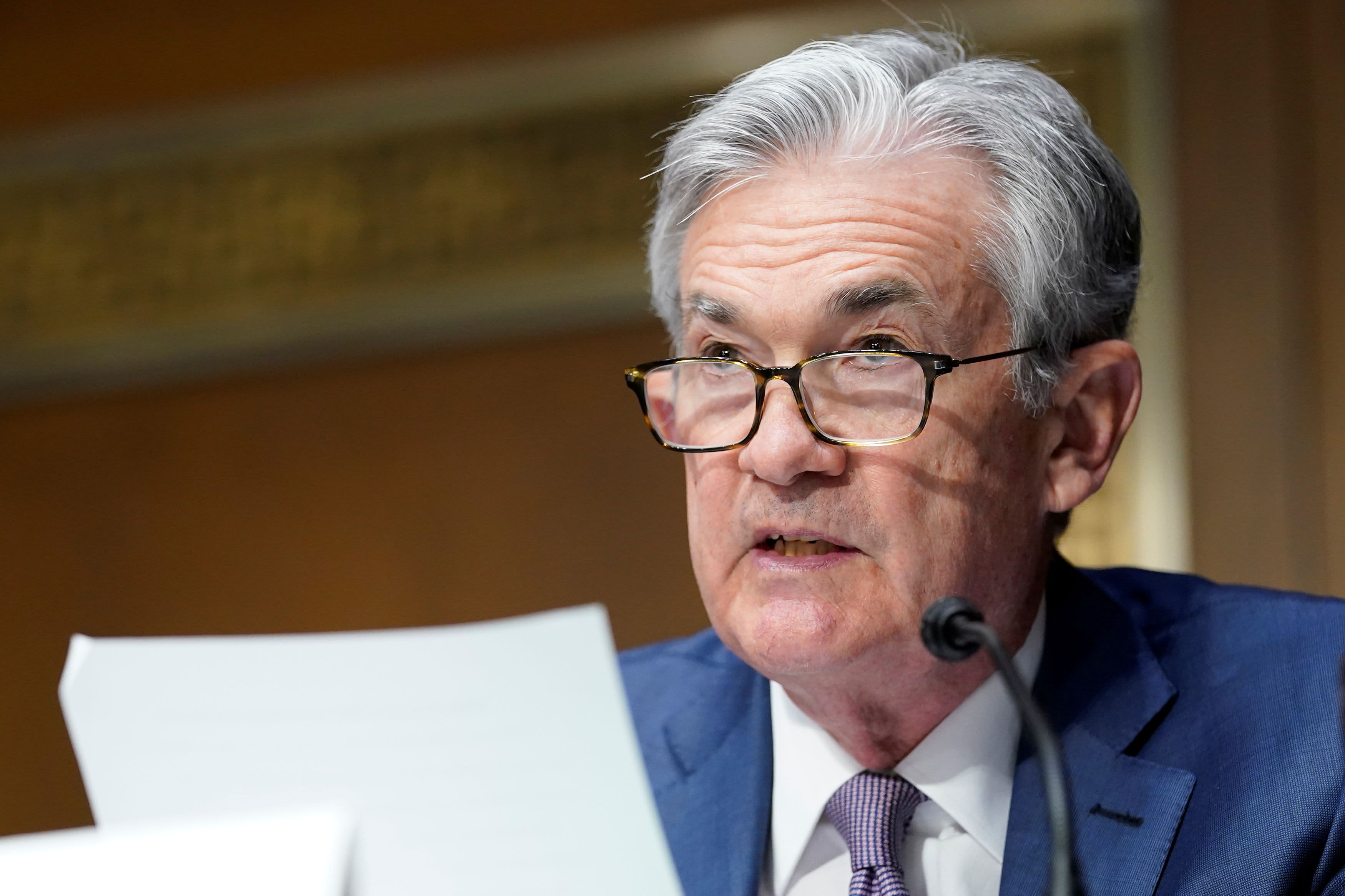 Fed to investigate risks posing climate change to financial system