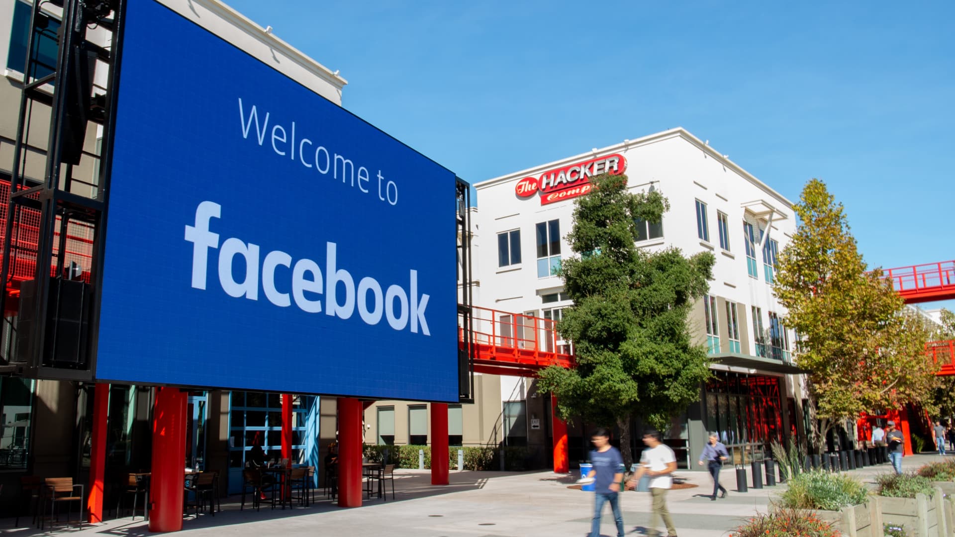 A giant digital sign is seen at Facebook's corporate headquarters campus in Menlo Park, California, on October 23, 2019.