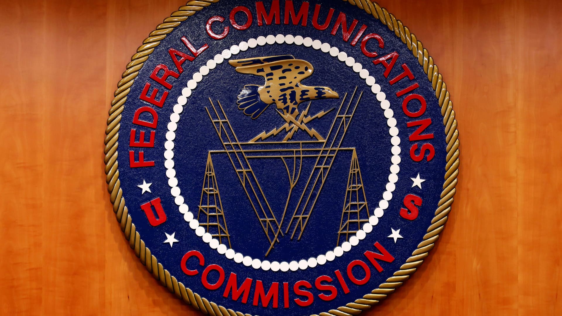 The Federal Communications Commission (FCC) logo is seen before the FCC Net Neutrality hearing in Washington February 26, 2015.