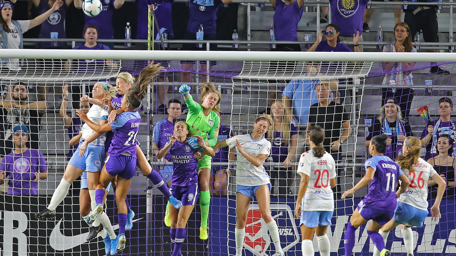 Alyssa Naeher #1 of Chicago Red Stars punches away a loose ball during a NWSL soccer match between the Chicago Red Stars and the Orlando Pride at Orlando City Stadium on September 11, 2019 in Orlando, Florida.