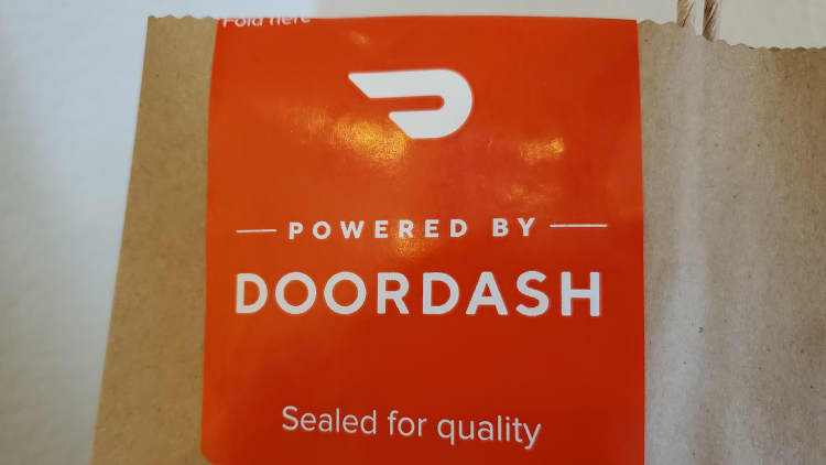 DoorDash opens for trading at $182 a share