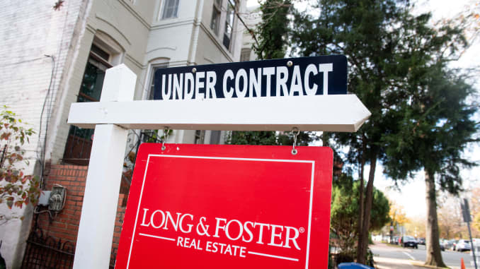A house's real estate for sale sign shows the home as being "Under Contract" in Washington, DC, November 19, 2020.