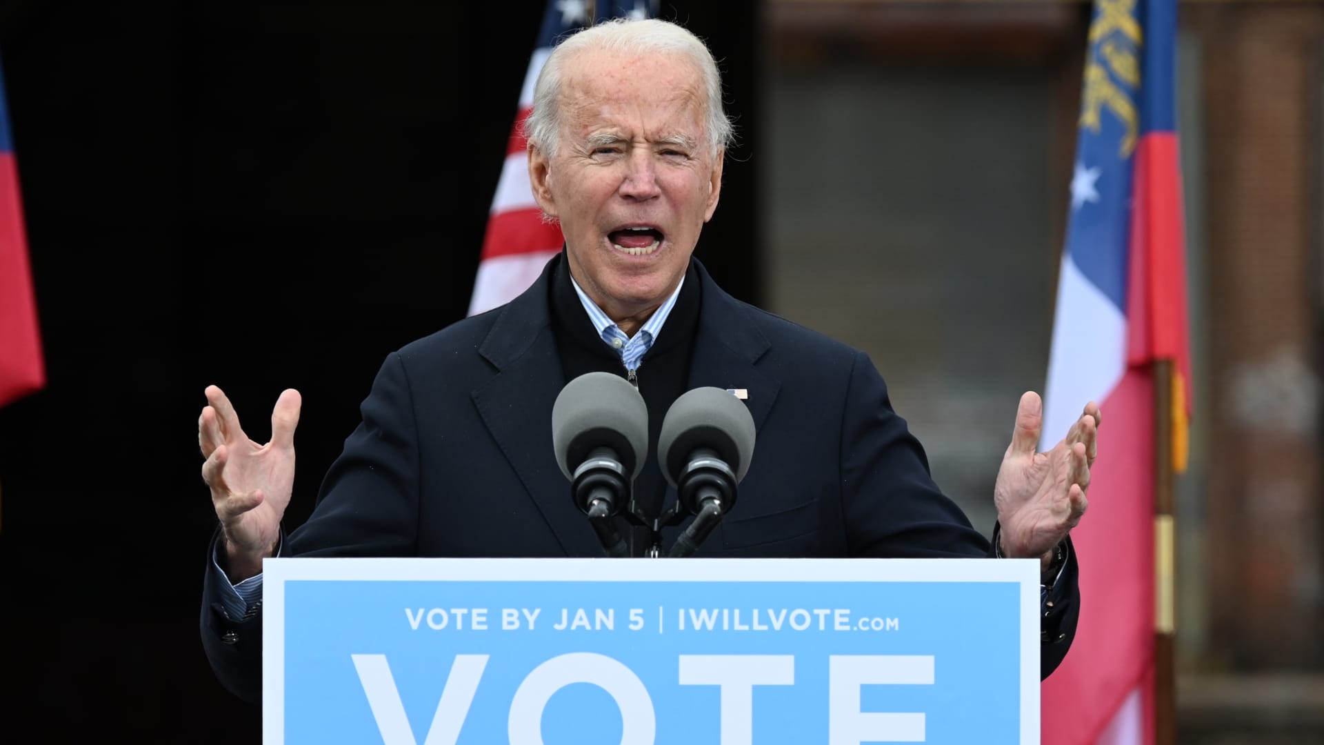 US President-elect Joe Biden speaks during a campagin rally to support Democratic Senate candidates in Atlanta, Georgia on December 15, 2020.