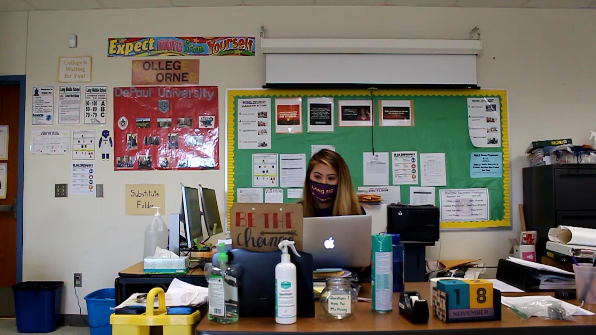 Lani Huang teaches middle school math to students in her classroom and online at the same time.