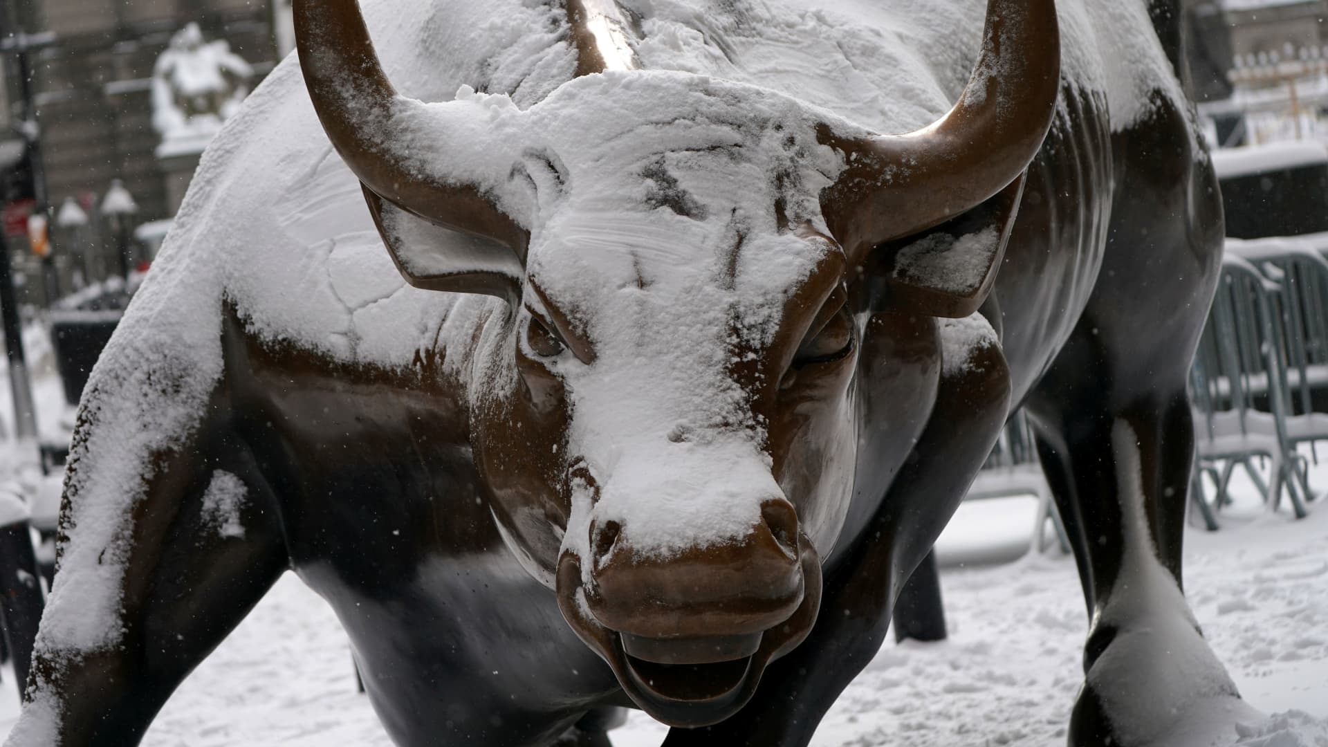 Snow covers the Charging Bull sculpture in the Financial District of Manhattan, New York City, New York, U.S., December 17, 2020.