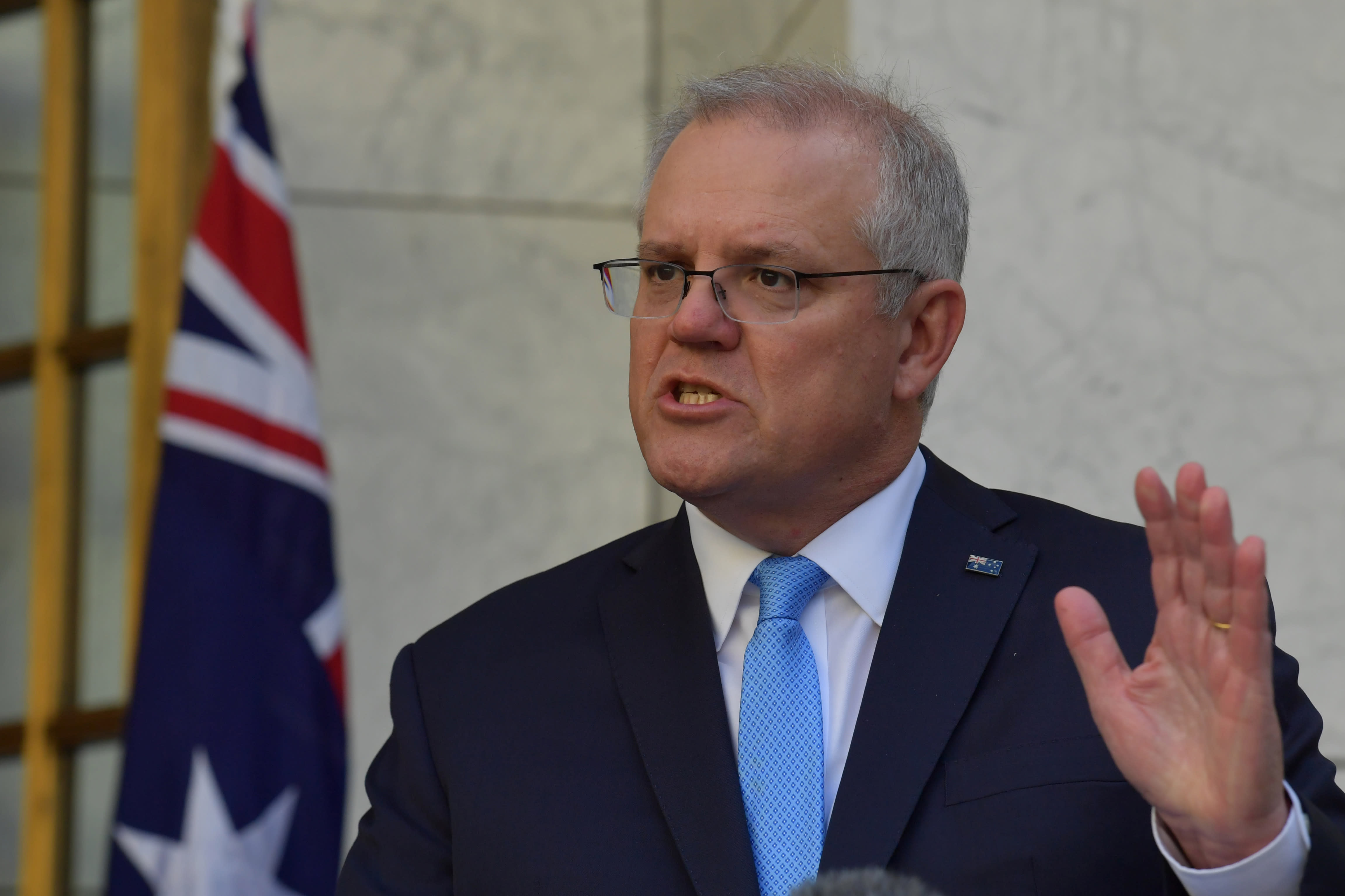 Australian PM Morrison defends lockdown strategy amid record daily cases