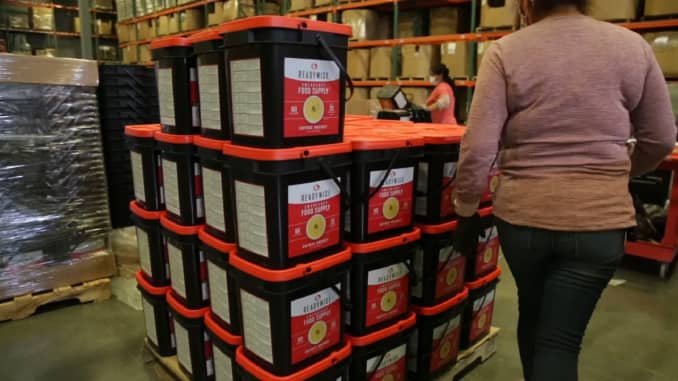 A pallet of ReadyWise emergency food supply buckets, each containing 60 servings of food with a 25-year shelf life.